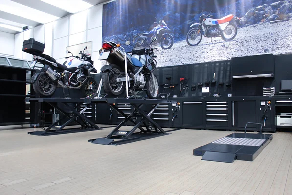 Hydraulic motorcycle lift installed in an Australian workshop