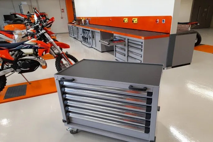 Specialist motorcycle workshop accessories including a wheel balancer