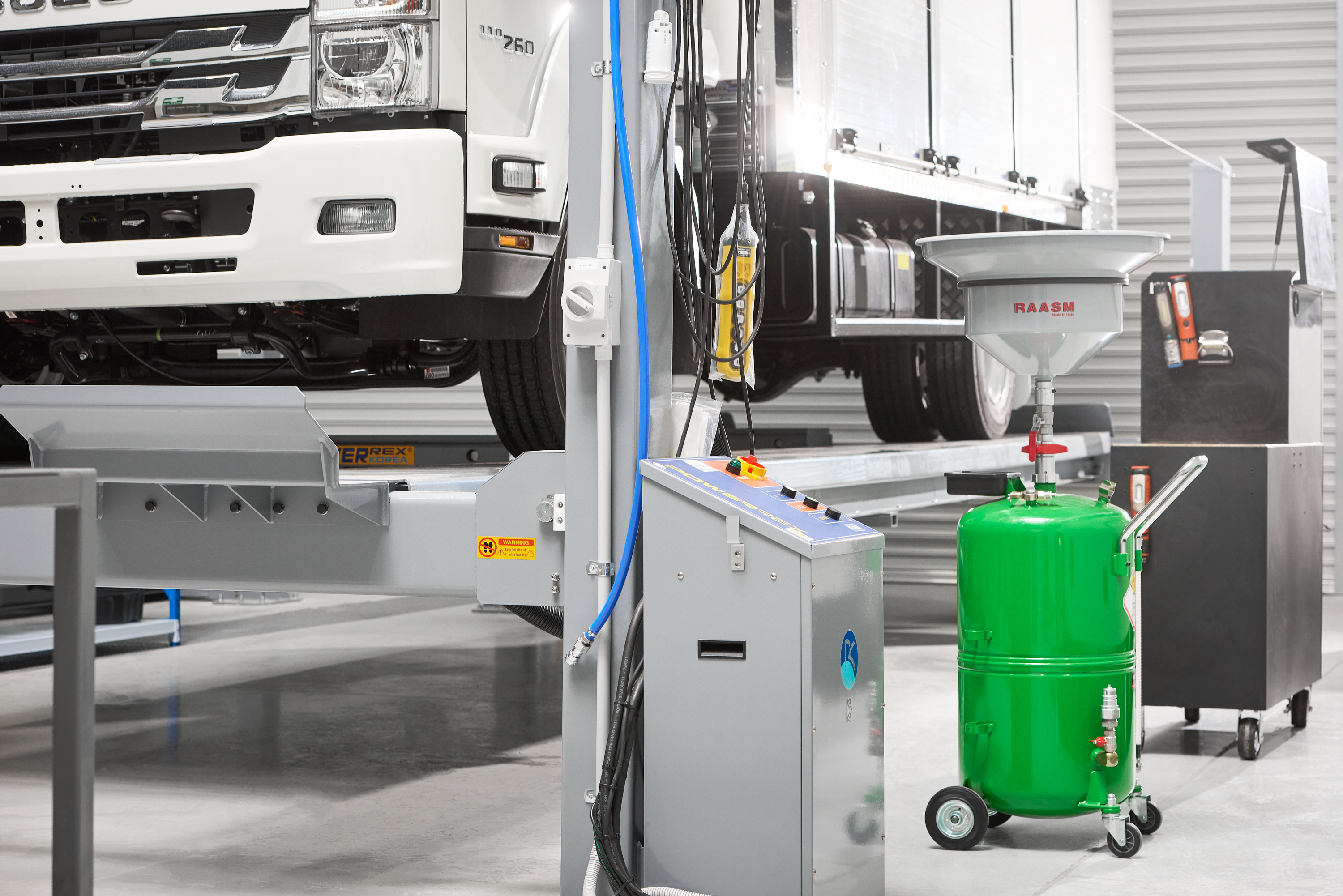 Heavy vehicle service pit in workshop